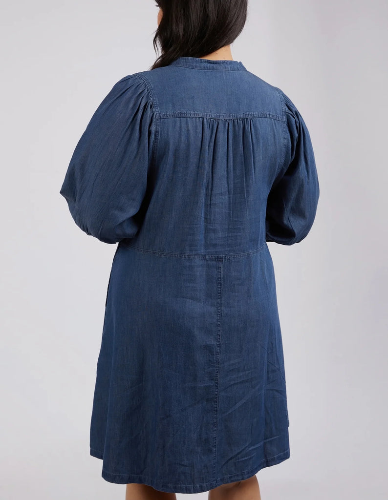 The Mid Blue Wash Filippa Dress by Elm is currently available at Rawspice Boutique.