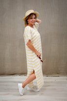 The Lemon Stripe Gemma Fringed Dress by Rustic Linen is available at Rawspice Boutique.