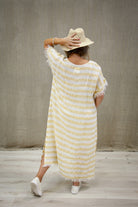 The Lemon Stripe Gemma Fringed Dress by Rustic Linen is available at Rawspice Boutique.