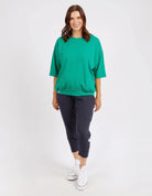 The Goodness Green Mazie Sweat by Elm is available at Rawspice Boutique. 