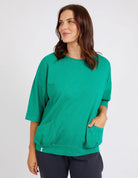 The Goodness Green Mazie Sweat by Elm is available at Rawspice Boutique. 