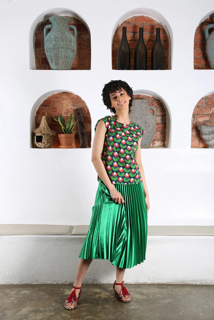 The Green Peace Lily Pleated Skirt by Olga de Polga is currently available at Rawspice Boutique. 