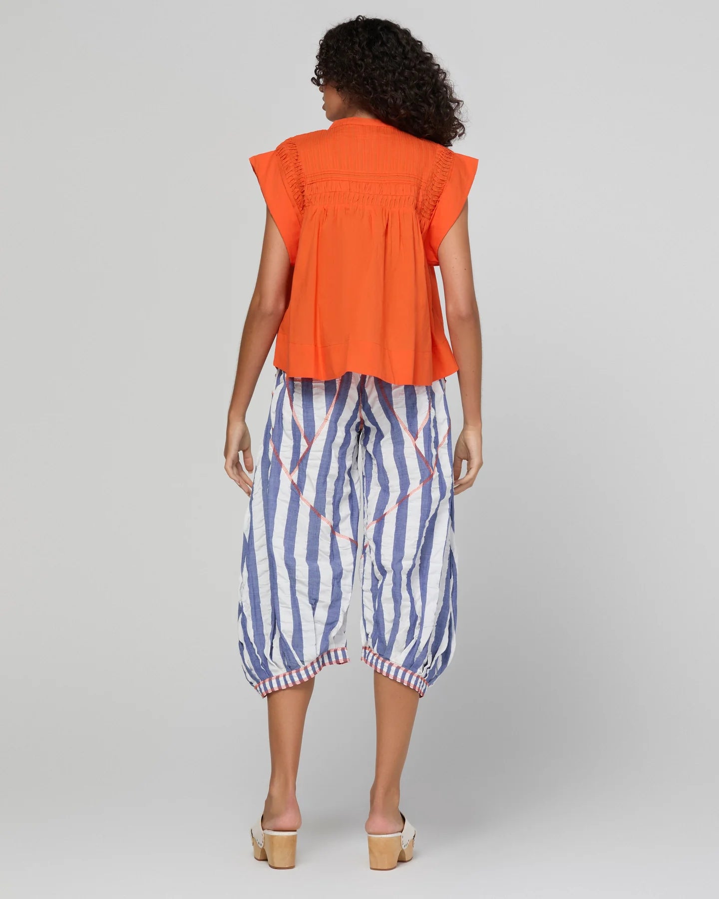 Boom Shankar Guru Pant in Ocean Stripe featuring blue and white stripes, a drawstring waistband, balloon-style legs and 3/4 length.