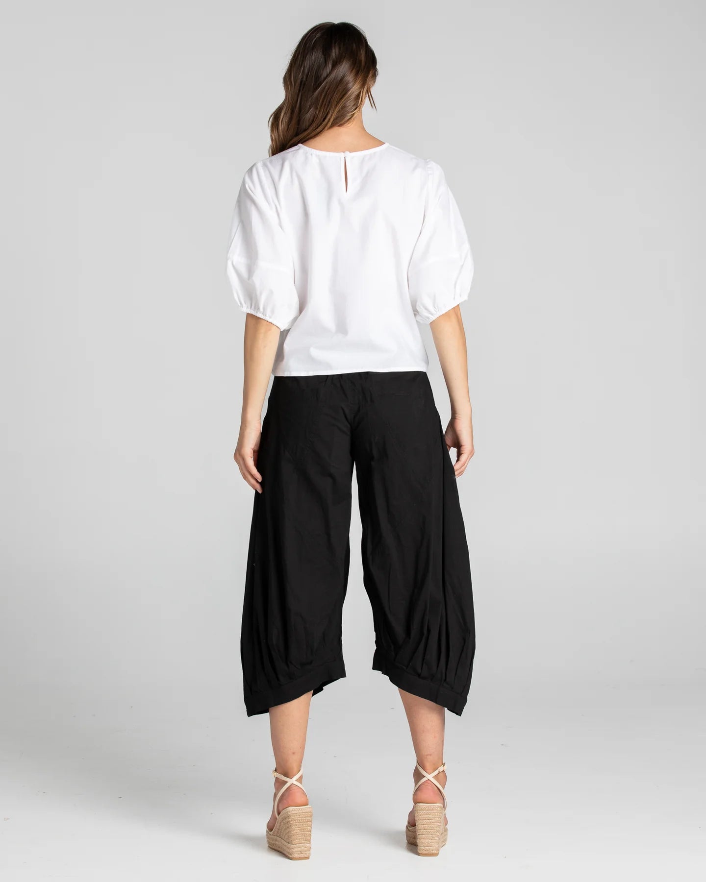 Boom Shankar Guru Pant in Coffee, featuring a relaxed fit with a drawstring waistband, 3/4 length, front and back pockets, and signature seam detailing.