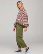 Dusty pink striped oversized sweater with cropped fit, balloon sleeves, ribbed trims and contrast stitching detail.