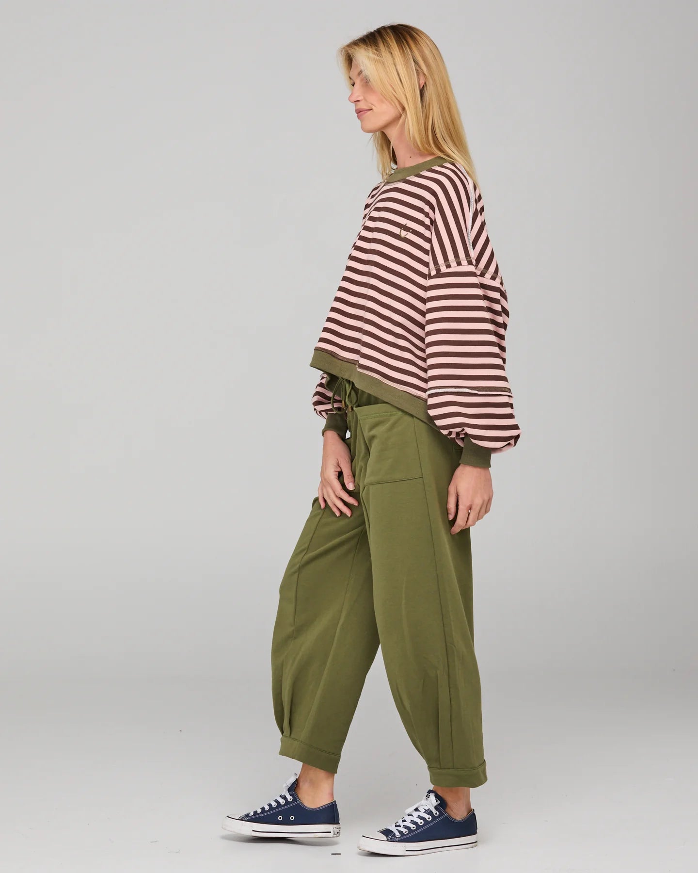 Khaki relaxed fit track pants with drawstring waist, ribbed waistband, contrast stitching and pockets front and back.