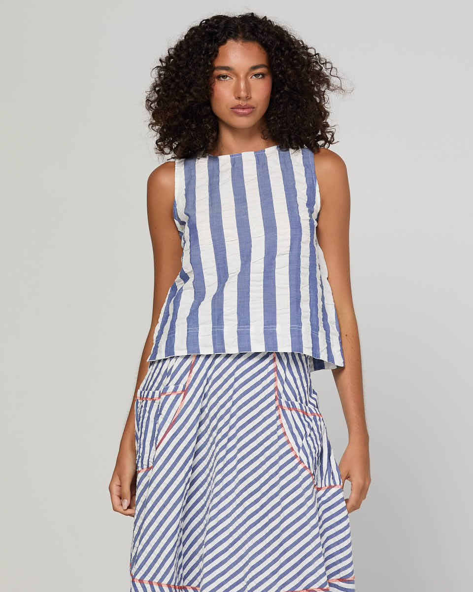 Boom Shankar Hara Top in Ocean Stripe featuring vertical stripes, a high scoop neckline, sleeveless design and fitted silhouette.