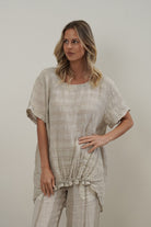 Helene oversized linen top in natural combo with breathable mesh panels, relaxed fit and soft stonewashed texture.