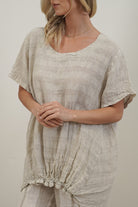 Helene oversized linen top in natural combo with breathable mesh panels, relaxed fit and soft stonewashed texture.