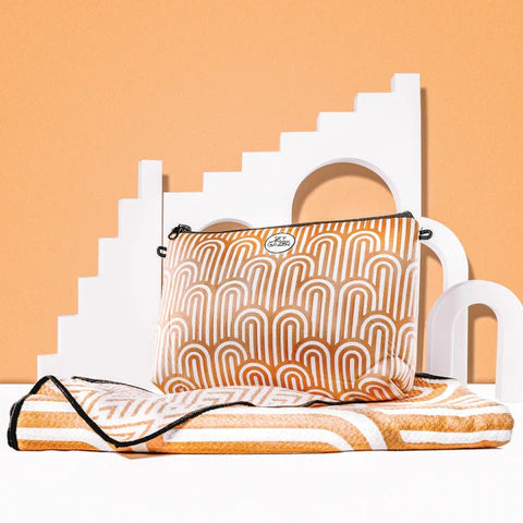 The Ultimate Beach Towel - The Henley by Sky Gazer is available at Rawspice Boutique.