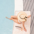 The Ultimate Beach Towel - The Henley by Sky Gazer is available at Rawspice Boutique.