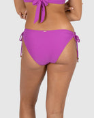 The Hibiscus Tie Side Hipster Bikini Bottom by Baku are available at Rawspice Boutique.