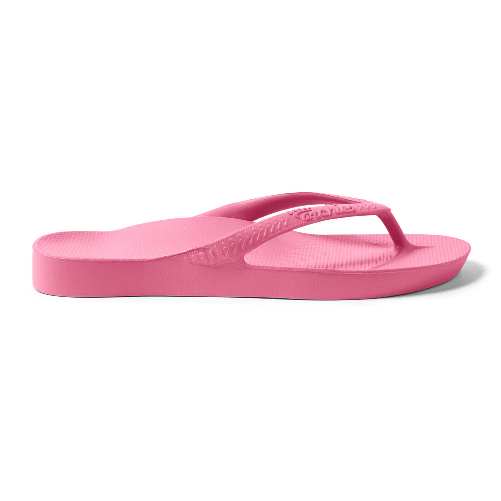 hot pink arch support thongs with contoured footbeds and ergonomic straps for enhanced comfort and stability.