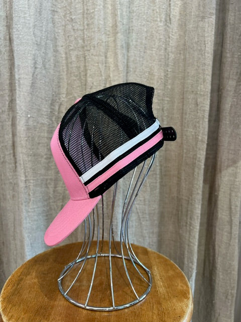 Rocks Hat in pink and white featuring a whale tail design on the front, snapback closure, and breathable mesh sides for a comfortable, adjustable fit.