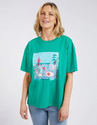 The Goodness Green Island In The Sun Tee by Elm is available at Rawspice Boutique.