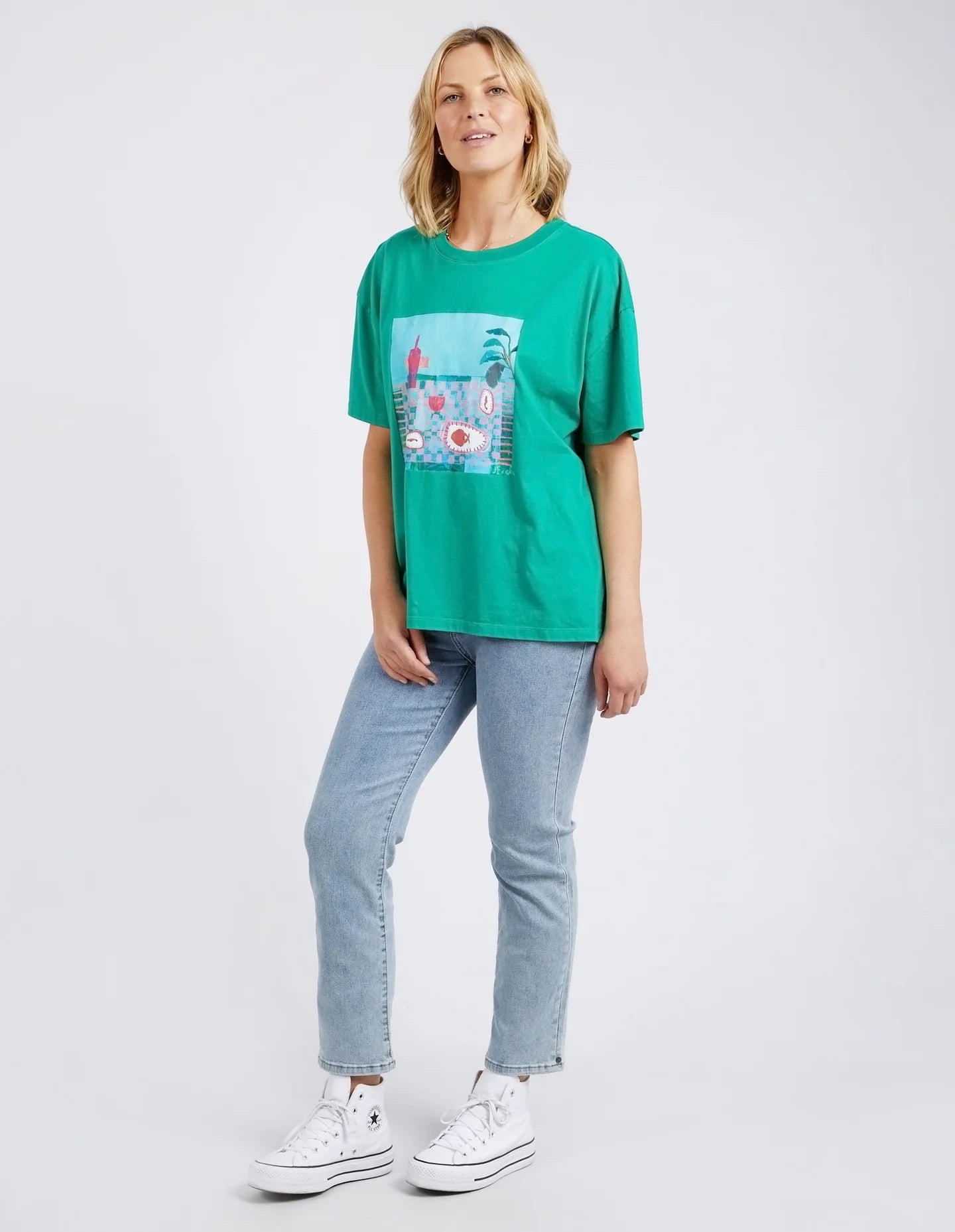 The Goodness Green Island In The Sun Tee by Elm is available at Rawspice Boutique.