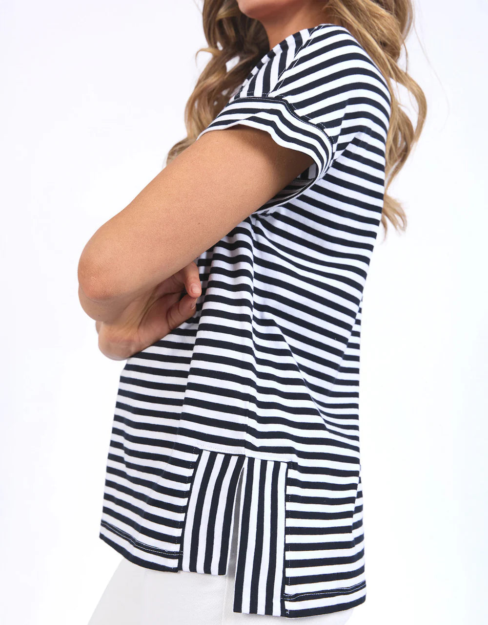 Navy and white striped Jarrah Short Sleeve Tee by Elm with a pink contrast neckline, relaxed fit, cuffed sleeves, and side splits.