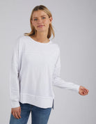 Woman wearing the Jayne Throw On Top styled for a relaxed coastal look.