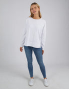Woman wearing the Jayne Throw On Top styled for a relaxed coastal look.