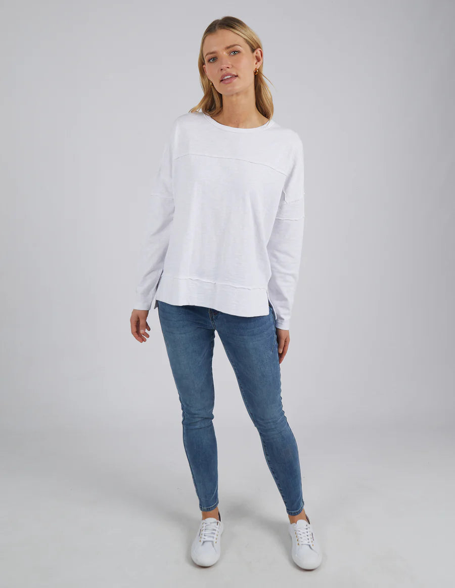 Woman wearing the Jayne Throw On Top styled for a relaxed coastal look.