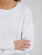 Woman wearing the Jayne Throw On Top styled for a relaxed coastal look.