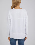 Woman wearing the Jayne Throw On Top styled for a relaxed coastal look.
