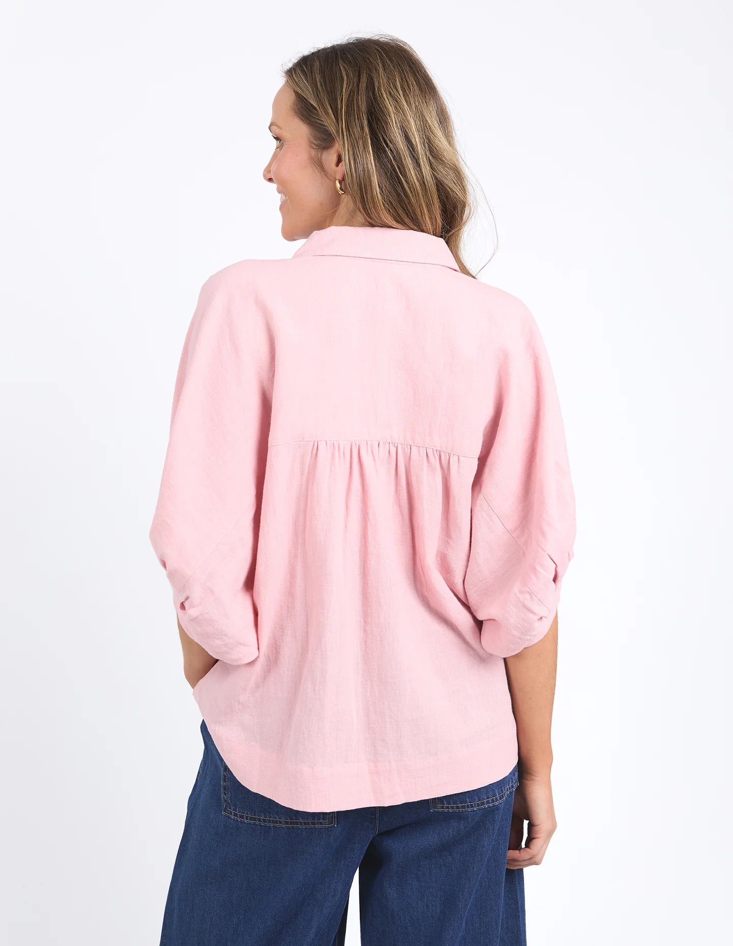 Pink blush oversized linen-viscose shirt with a full button front, collar, and cuffed 3/4 balloon sleeves for a relaxed yet stylish look.