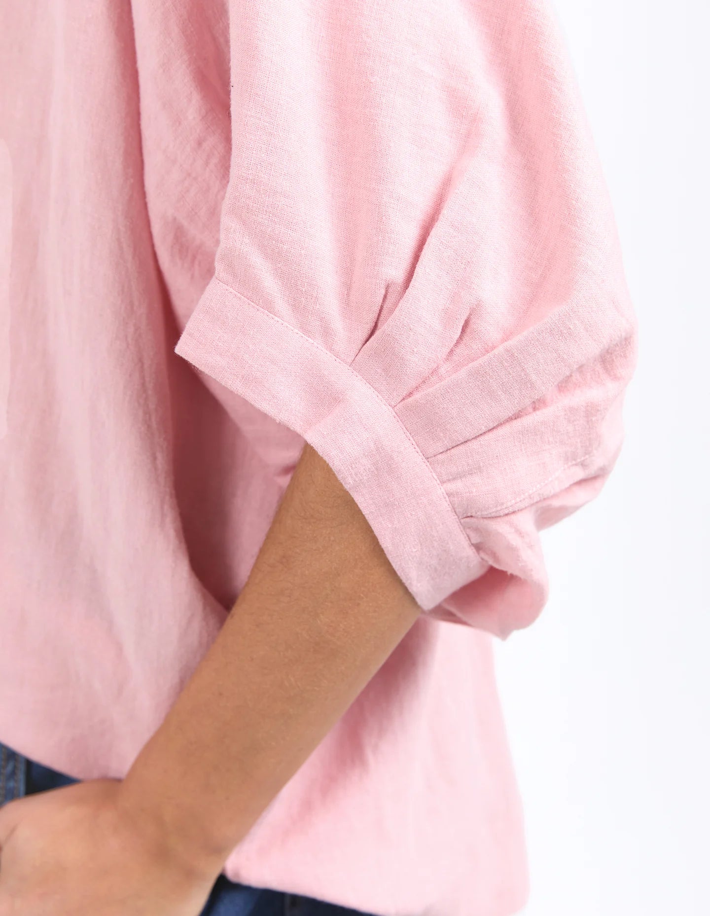 Pink blush oversized linen-viscose shirt with a full button front, collar, and cuffed 3/4 balloon sleeves for a relaxed yet stylish look.