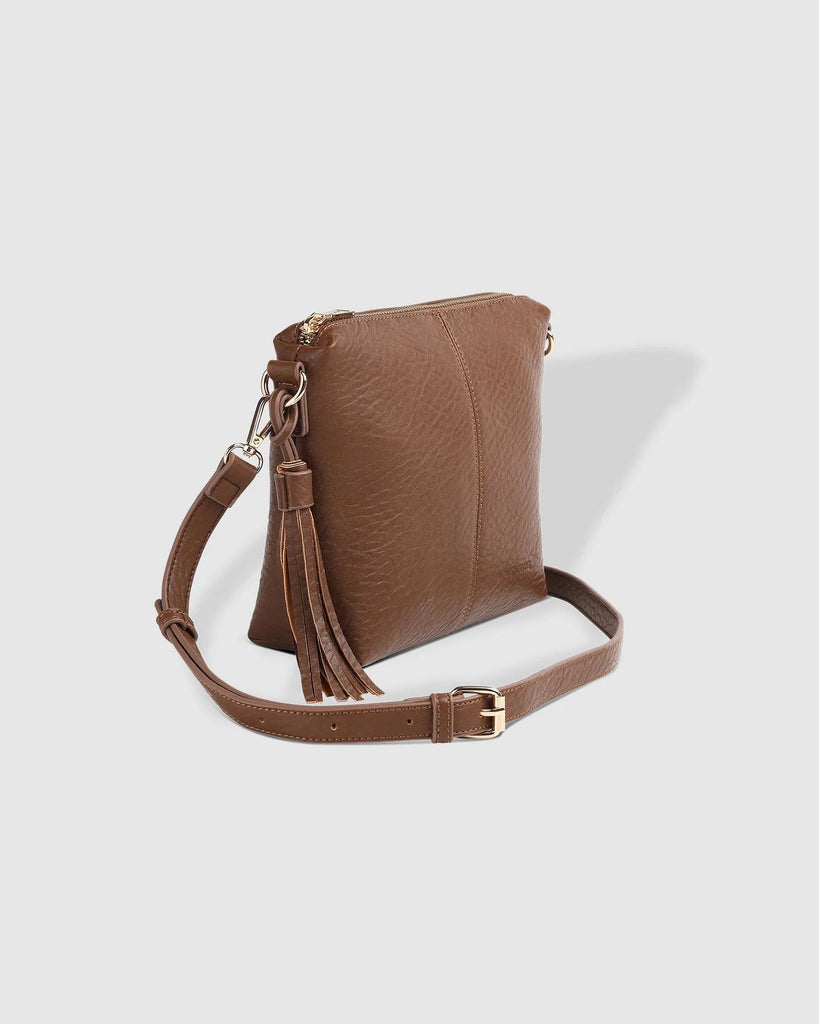 The Cocoa Kasey Textured Crossbody Bag With Logo Strap by LOUENHIDE is currently available at Rawspice Boutique.