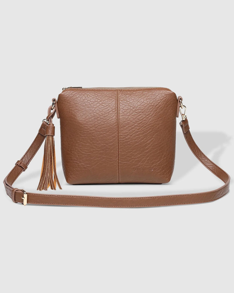 The Cocoa Kasey Textured Crossbody Bag With Logo Strap by LOUENHIDE is currently available at Rawspice Boutique.