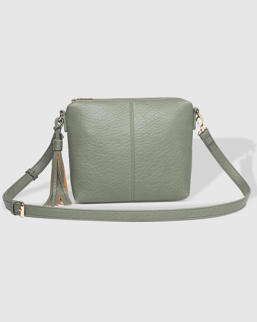 The Light Khaki Kasey Textured Crossbody Bag With Logo Strap by LOUENHIDE is currently available at Rawspice Boutique.