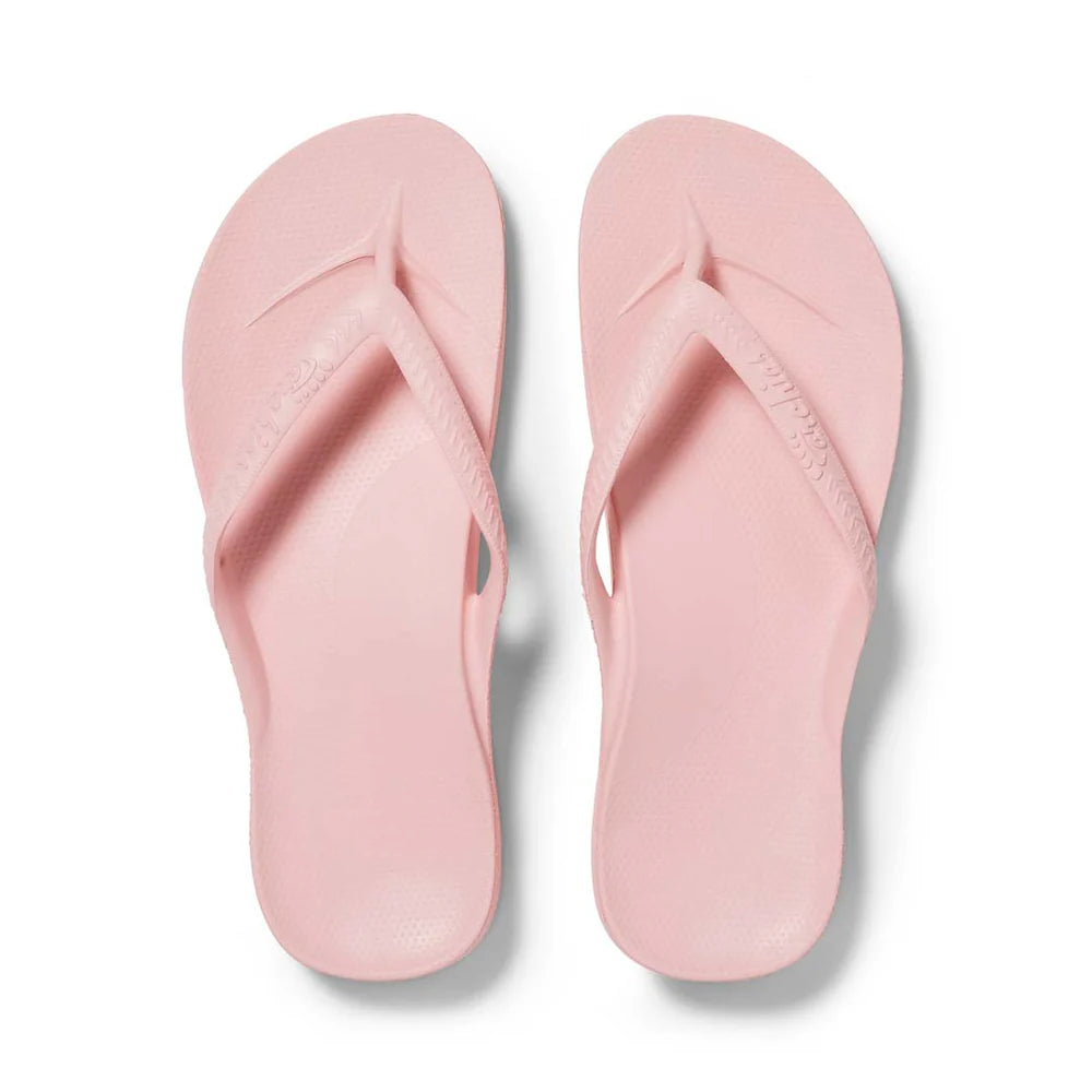Pink Archies support thongs with up to 2.2cm orthotic support, designed for comfort and foot alignment, perfect for plantar fasciitis relief.