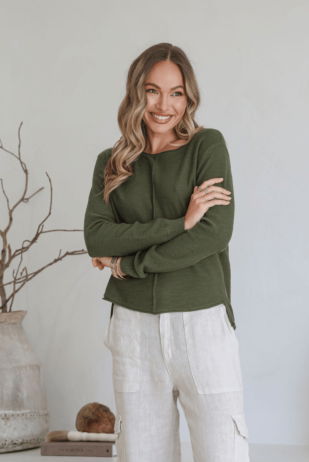 Moss 100% cotton light knit top with a breathable, timeless design, ideal for layering or wearing alone for everyday comfort and style.