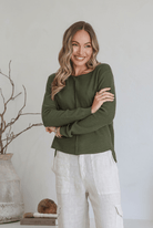 Moss 100% cotton light knit top with a breathable, timeless design, ideal for layering or wearing alone for everyday comfort and style.