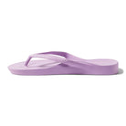 Lilac arch support thongs with contoured footbeds and ergonomic straps for enhanced comfort and stability.