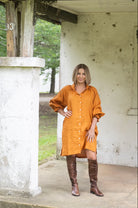 The Marigold Dahlia Dress by Don't Tell My Husband is available at Rawspice Boutique.