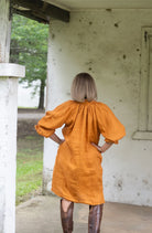 The Marigold Dahlia Dress by Don't Tell My Husband is available at Rawspice Boutique.