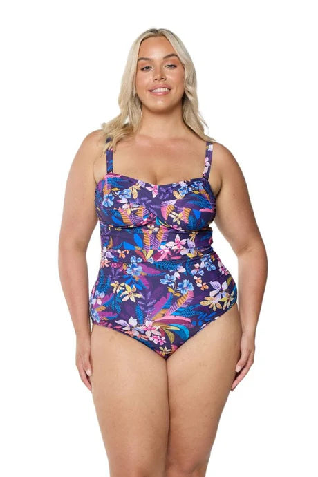 A tropical floral Majorca twist front bandeau one-piece swimsuit, designed with or without straps, offering a flattering fit and support for bust sizes up to G cup.
