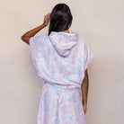 The Malua Surf Poncho is a sand-free, super-absorbent, quick-drying hooded towel. Lightweight, antibacterial, and soft, with a pocket and optional waist tie.