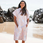 The Malua Surf Poncho is a sand-free, super-absorbent, quick-drying hooded towel. Lightweight, antibacterial, and soft, with a pocket and optional waist tie.