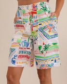 Vibrant Marrakesh print linen shorts with mid-thigh length, relaxed fit, two side pockets, and a tailored waistband with zip and hook closure.