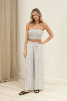 Mia Linen Pants in 100% mesh stonewashed linen, featuring a relaxed fit and lightweight, breathable fabric.