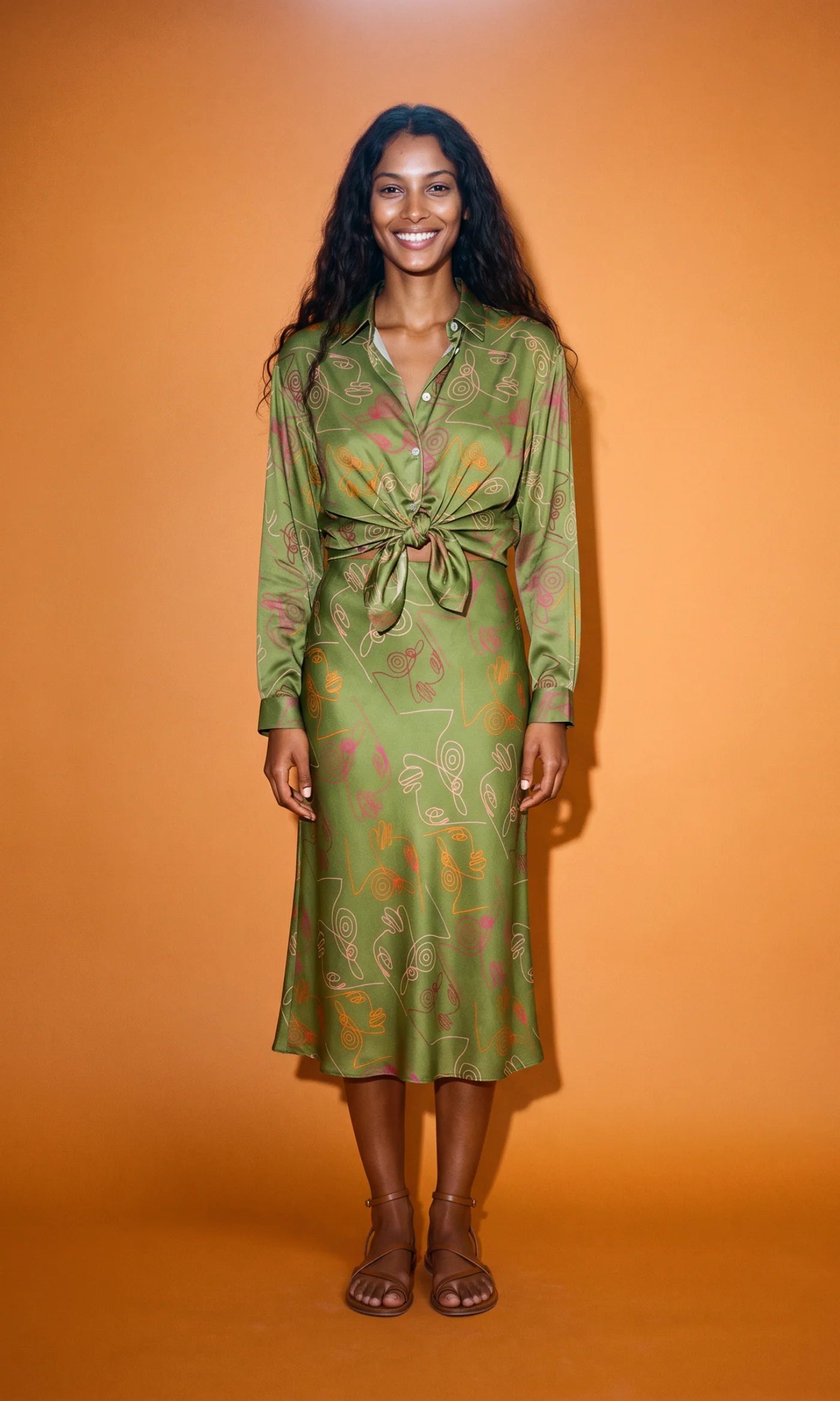 Women's Verdant Bias Midi Skirt in deep olive printed satin crepe, featuring a flattering bias cut, elegant midi length and softly flowing silhouette.
