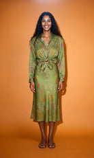 Women's Verdant Bias Midi Skirt in deep olive printed satin crepe, featuring a flattering bias cut, elegant midi length and softly flowing silhouette.