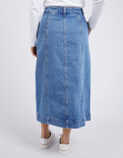 The Blue Florence Button Thru Denim Skirt Mid bu Elm is currently available at Rawspice Boutique.