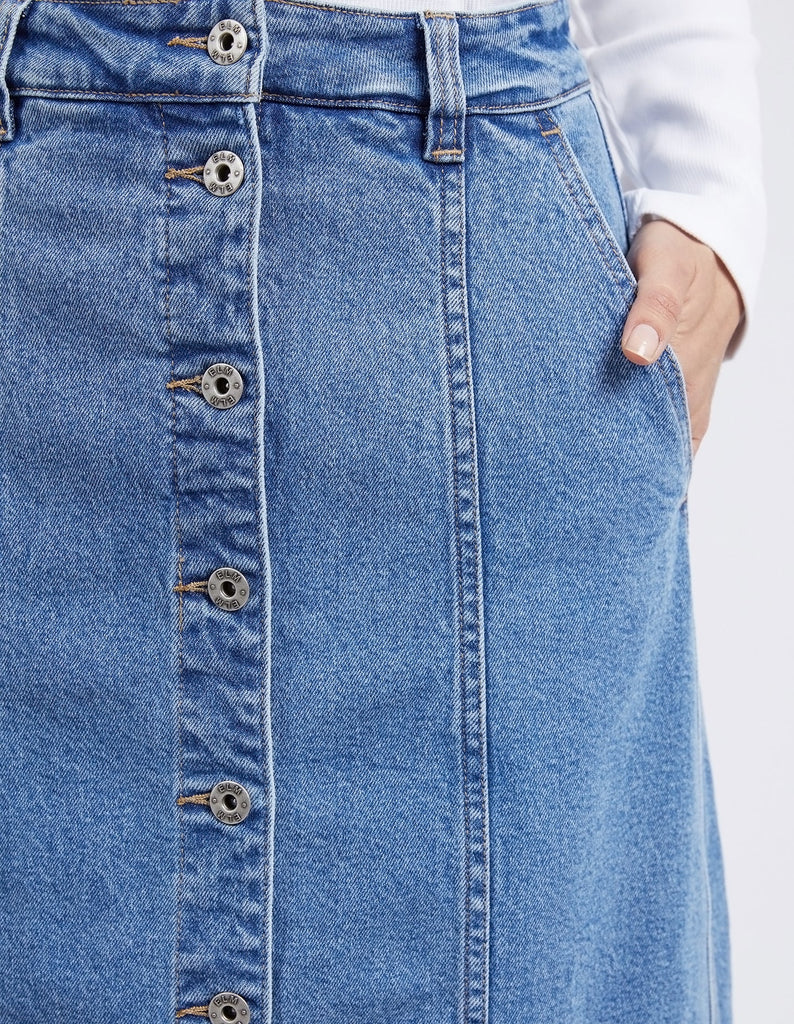 The Blue Florence Button Thru Denim Skirt Mid bu Elm is currently available at Rawspice Boutique.