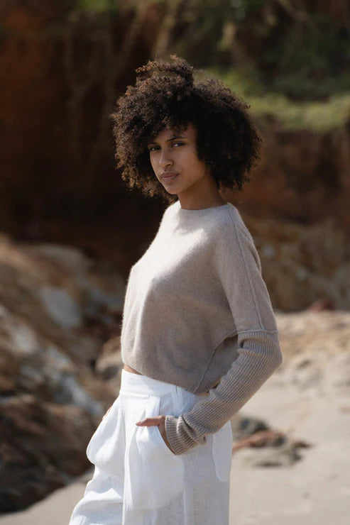 Miri Cashmere Sweater in oatmeal, lightweight and soft, with a cozy, minimalist look.
