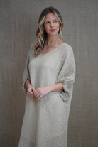 A breezy and elegant kaftan made from 100% mesh stonewashed linen in a natural hue. Designed with a relaxed fit, elasticated sleeves for comfort, and side splits for added movement. Lightweight, breathable, and effortlessly stylish—perfect for warm days, beachside retreats, or casual layering.