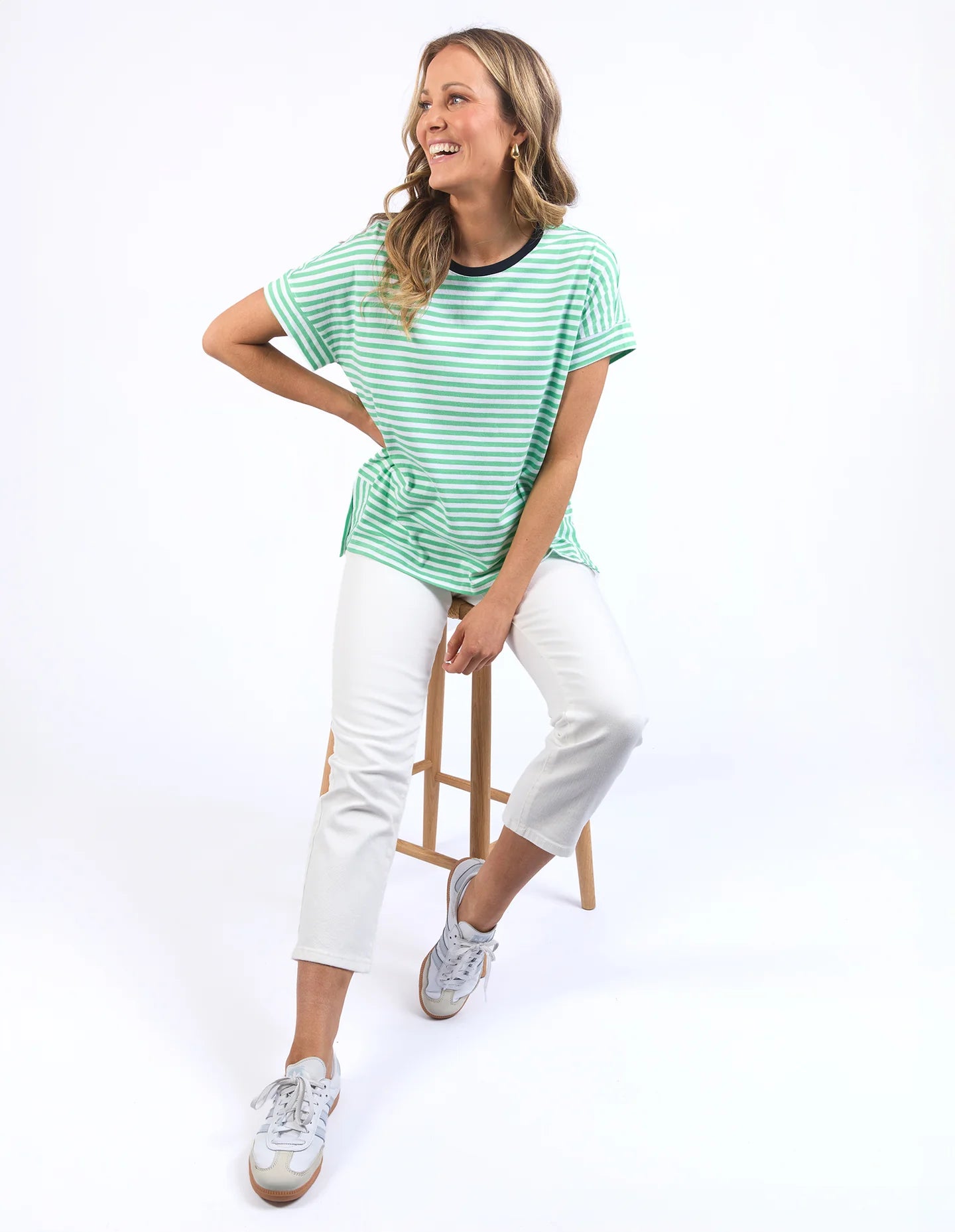 Neon mint, white, and navy striped Jarrah Tee by Elm with a relaxed fit, cuffed sleeves, and side splits, crafted from soft cotton jersey.