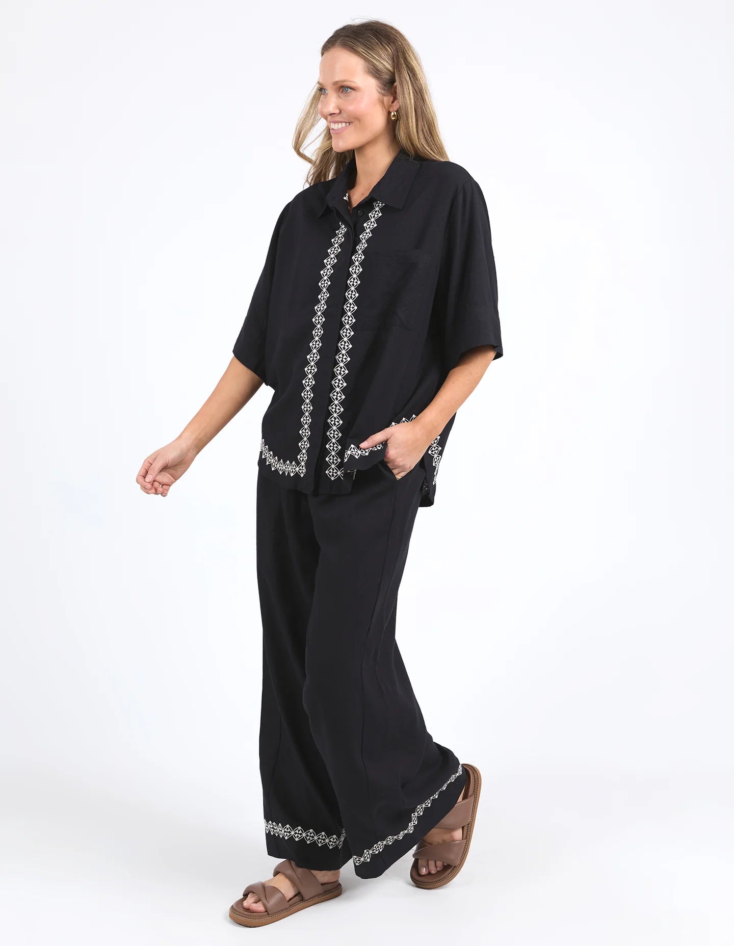 Nina Embroidered Shirt in Black featuring delicate embroidery on the front placket and hemline, made from a soft linen-viscose blend with an oversized fit.